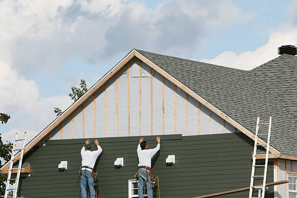 Professional Siding technician working in Westfield, NC